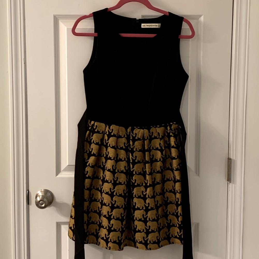 SM wardrobe (boutique brand) elephant dress, size small. worn once. ties in back